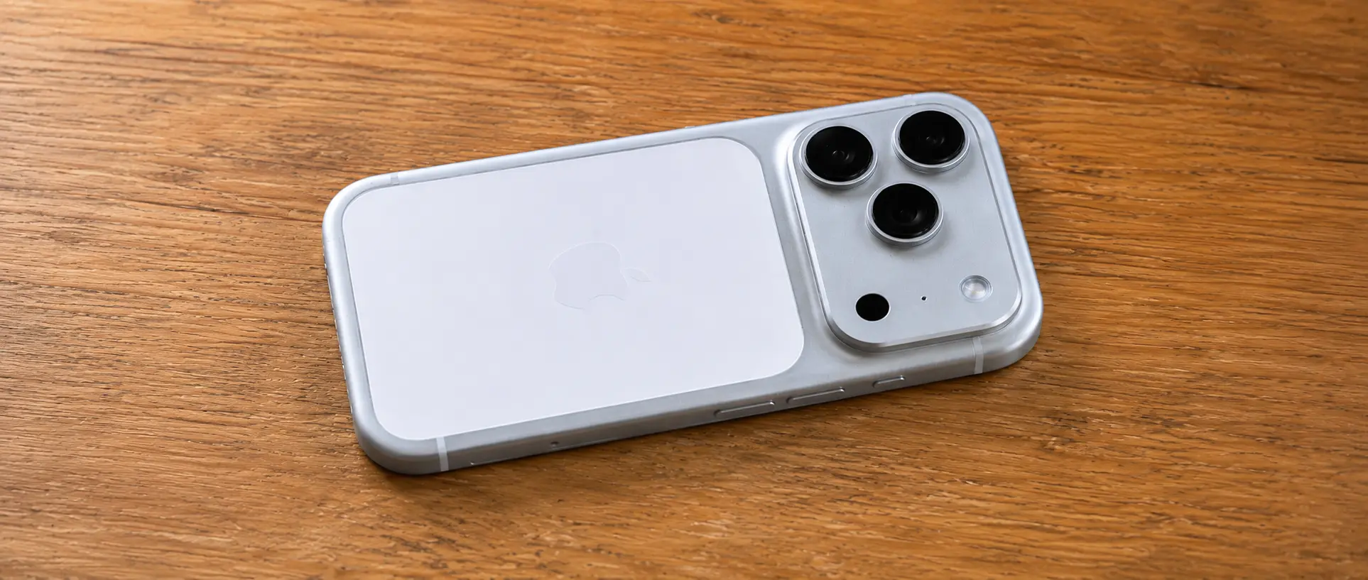 Apple iPhone 17 Pro in Silver, rear view showing the full-width camera plateau